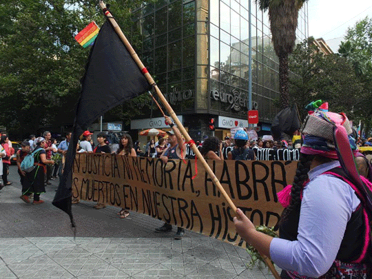 Protestors with a banner