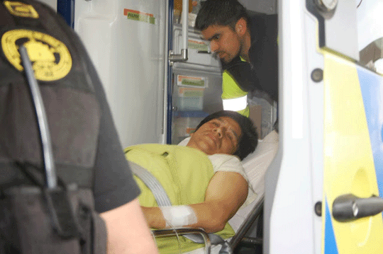 José Mariano Llanca Tori on a stretcher