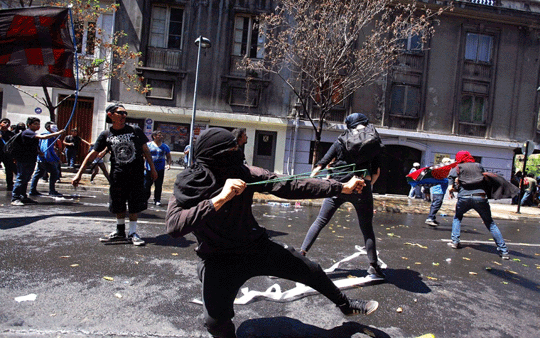 Some of the protesters threw rocks and other objects at police after the main, peaceful march earlier Saturday