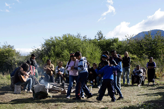 Dancing and celebrating around the fire. (Photo: Fabio D&rsquo;Errico)
